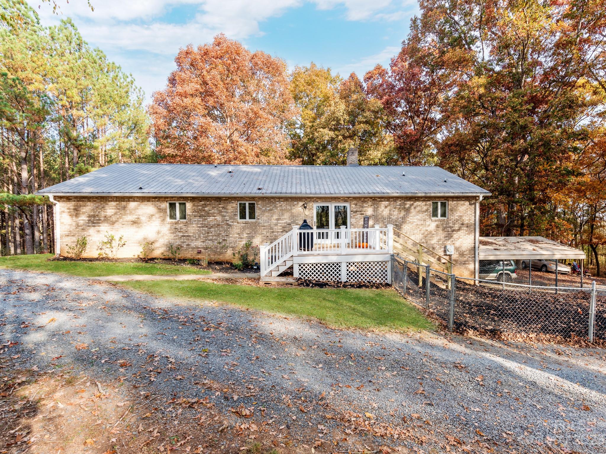33702 Western Road Albemarle, NC 28001 - Photo 36 of 42 a front view of a house with garden