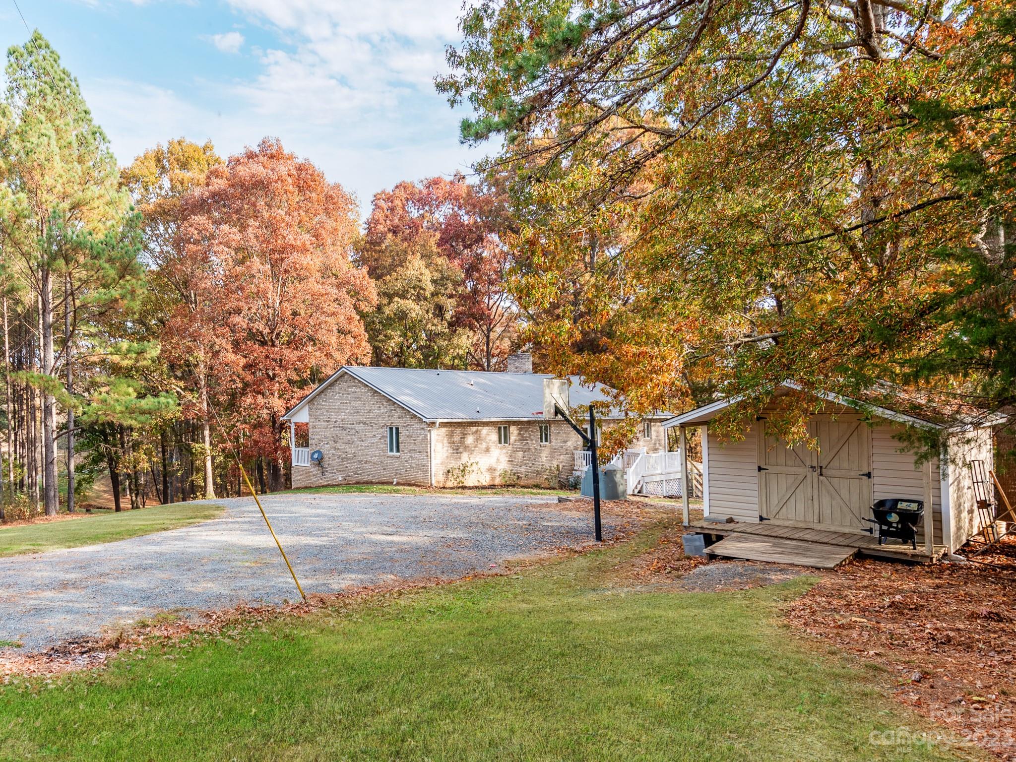 33702 Western Road Albemarle, NC 28001 - Photo 40 of 42 a house with trees in the background
