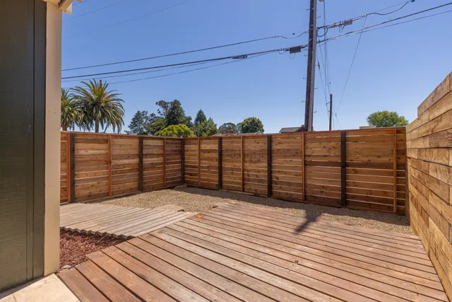 a view of a backyard of the house