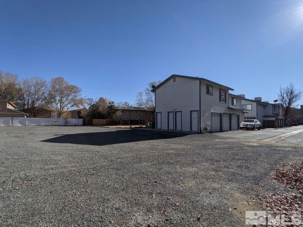 0 East 5th Carson City, NV 89701 - Photo 16 of 38 a view of a house with a yard