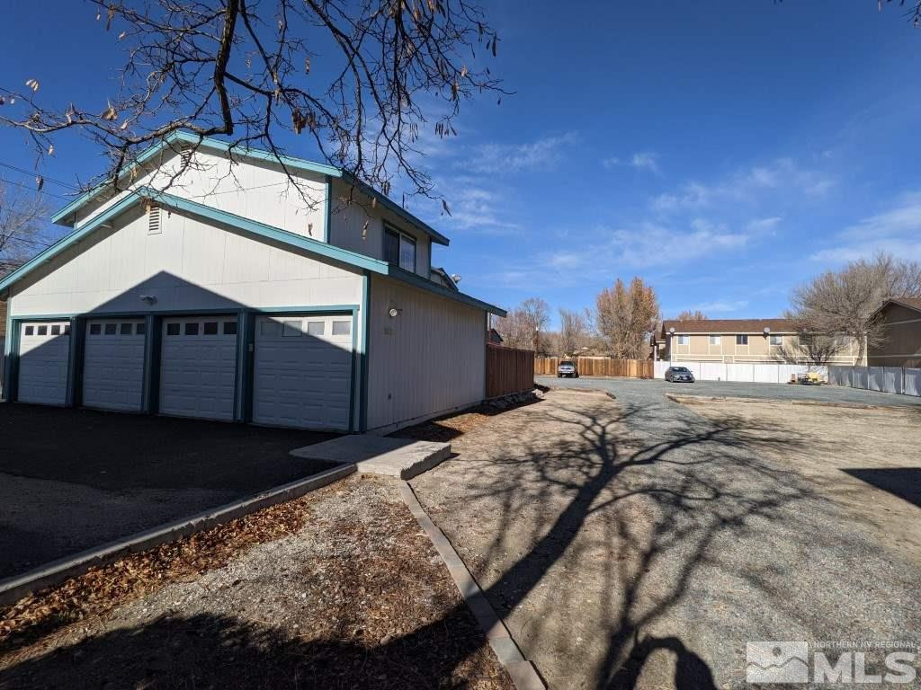0 East 5th Carson City, NV 89701 - Photo 23 of 38 a view of a house with a snow in the yard