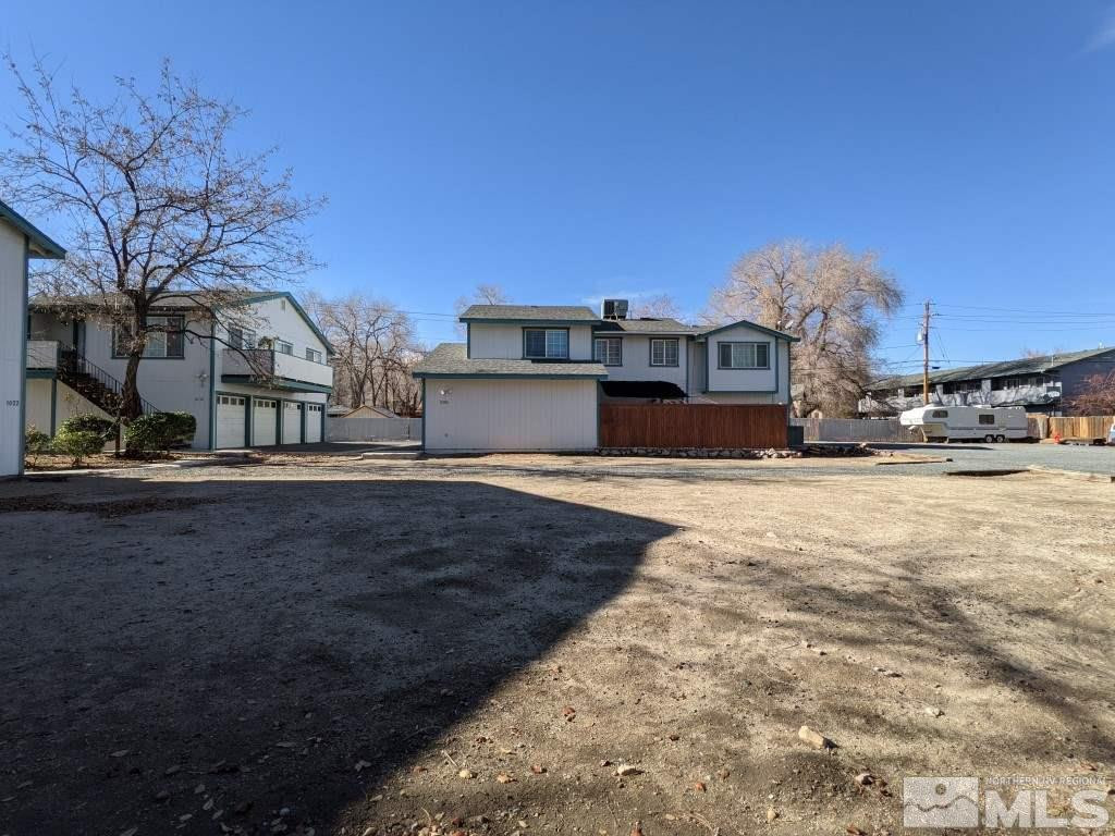 0 East 5th Carson City, NV 89701 - Photo 30 of 38 a front view of a house with a yard
