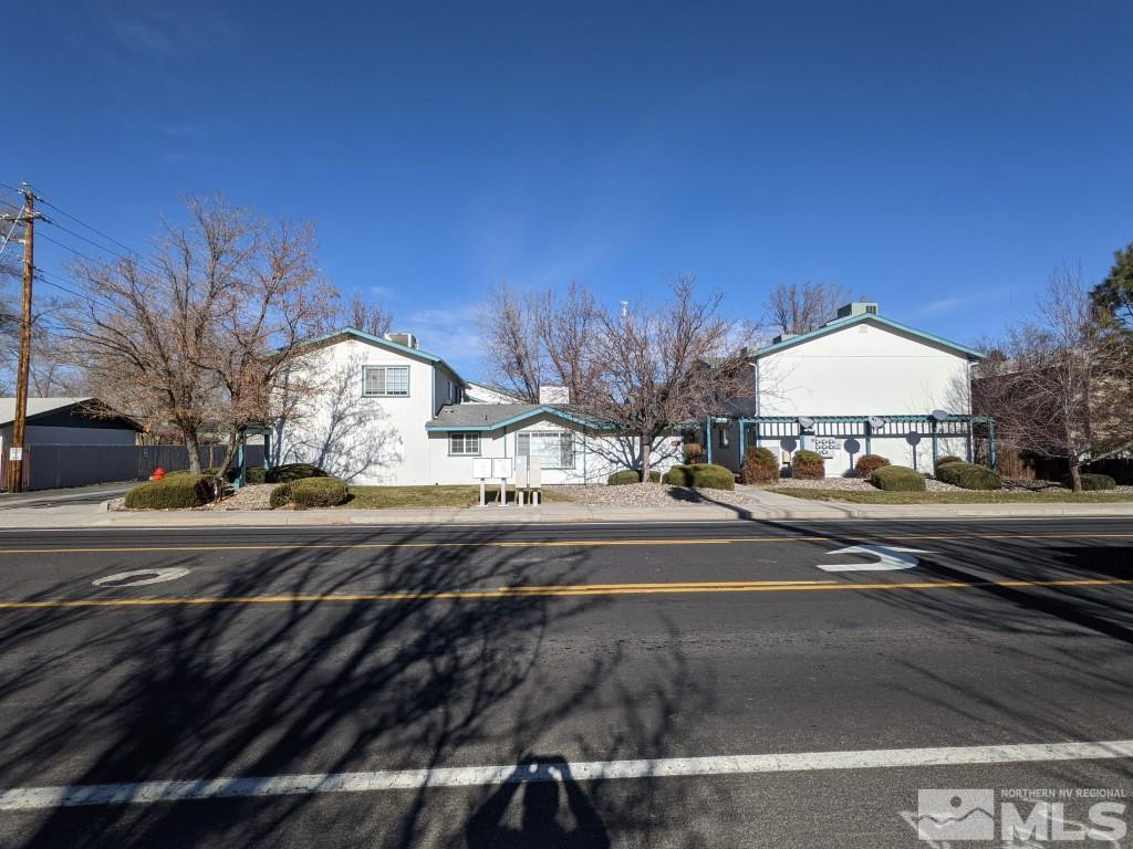 0 East 5th Carson City, NV 89701 - Photo 5 of 38 a view of a house with car parked on the road
