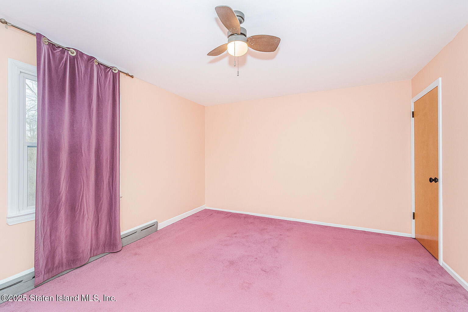5 Stone Street Staten Island, NY 10304 - Photo 20 of 35 a view of a room with a fan and a window