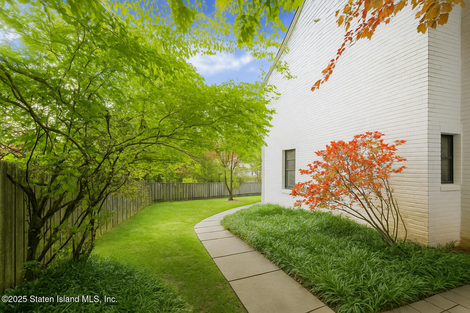 5 Stone Street Staten Island, NY 10304 - Photo 33 of 35 a view of a yard with plants and a large tree