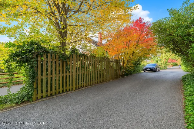 a view of a street with a trees