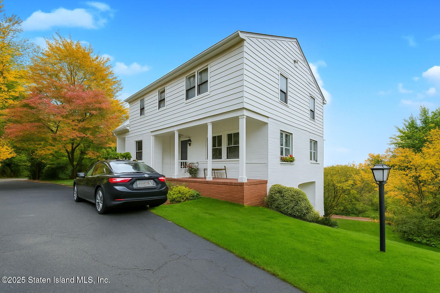 5 Stone Street Staten Island, NY 10304 - Photo 5 of 35 a car parked in front of a house