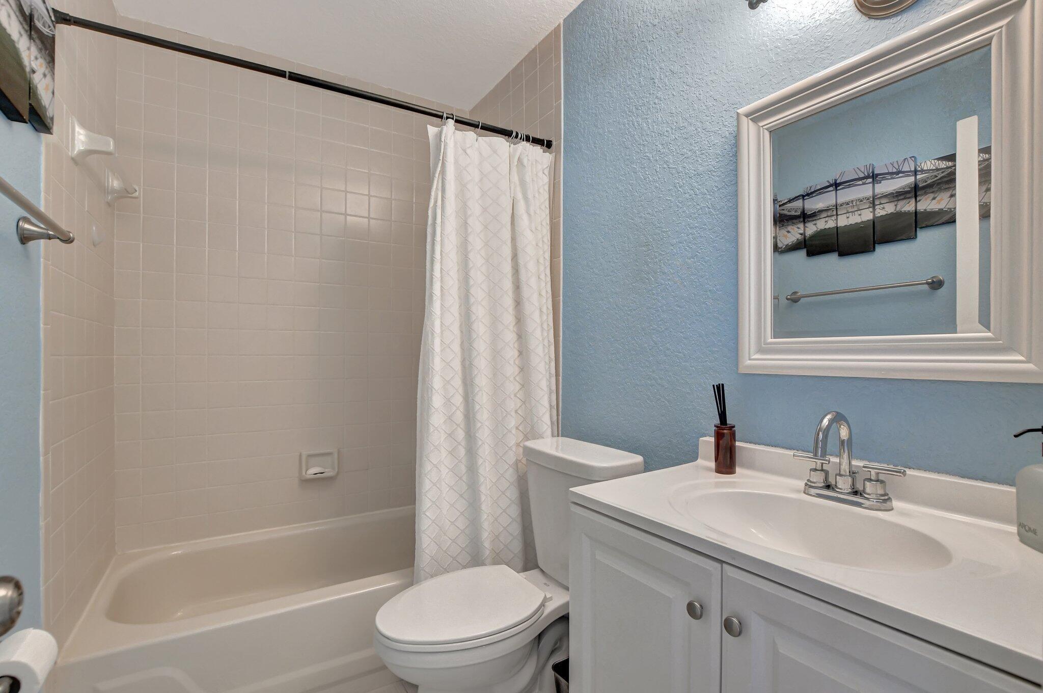 6682 Via Regina Boca Raton, FL 33433 - Photo 16 of 46 a bathroom with a sink toilet and shower