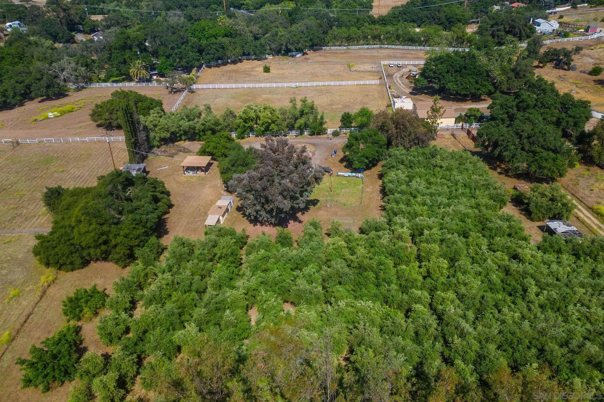 14066 Cool Valley Road Valley Center, CA 92082 - Photo 33 of 34 a view of a water pond with green field