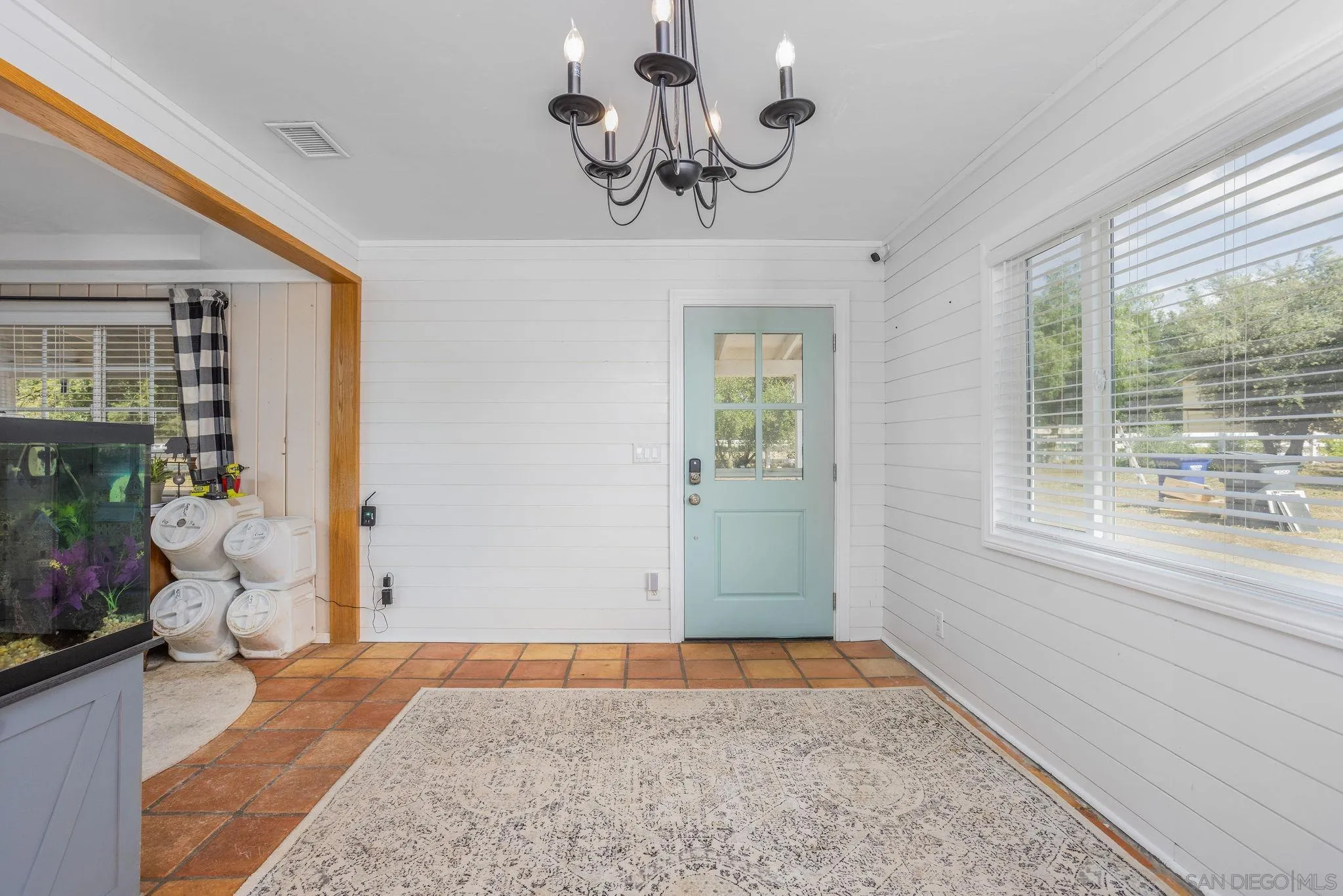 14066 Cool Valley Road Valley Center, CA 92082 - Photo 6 of 34 a view of an entryway with wooden floor and windows