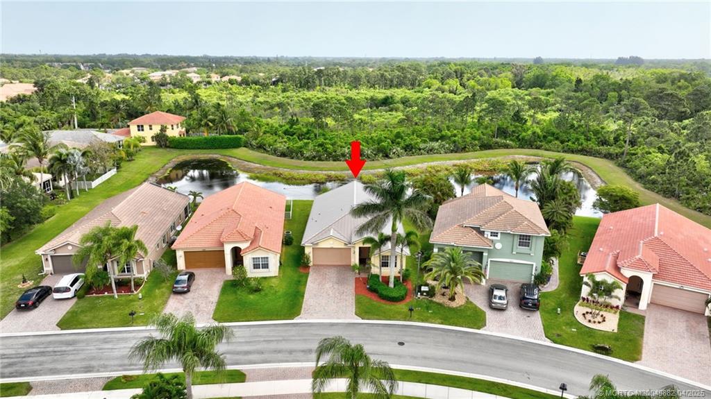 5195 Southeast Graham Drive Stuart, FL 34997 - Photo 43 of 52 an aerial view of residential houses and outdoor space