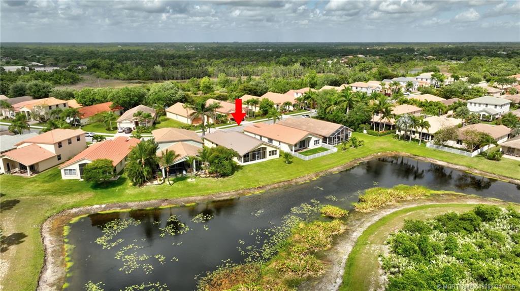 5195 Southeast Graham Drive Stuart, FL 34997 - Photo 48 of 52 an aerial view of residential houses with outdoor space