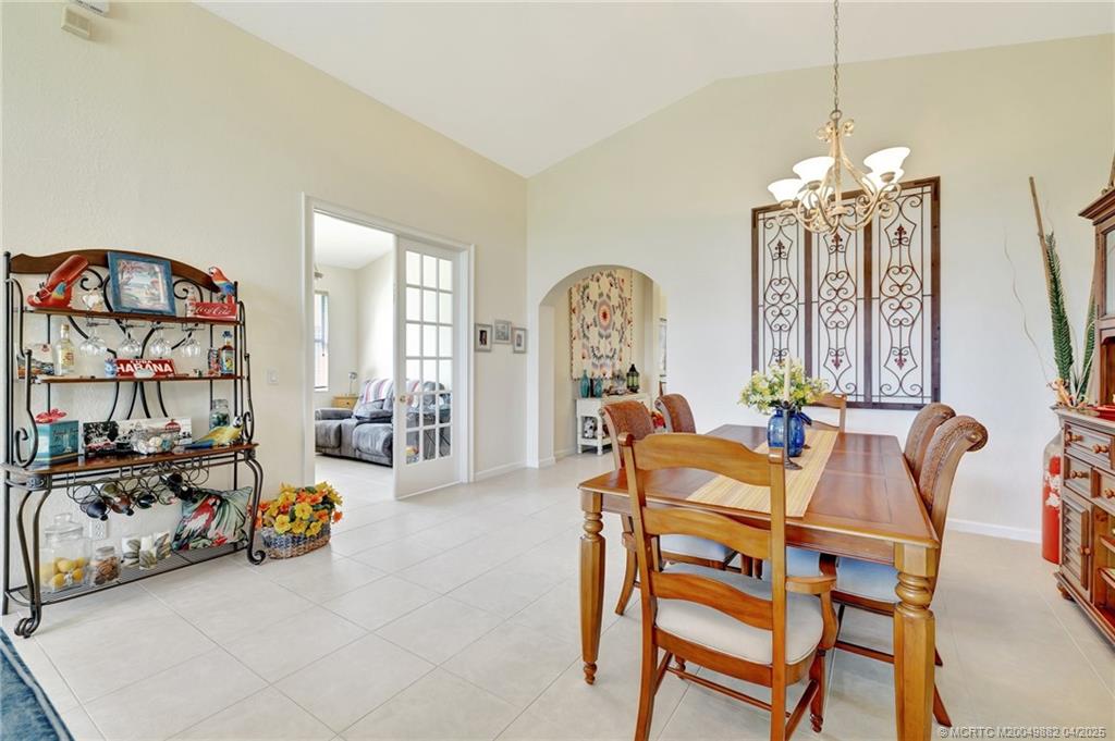 5195 Southeast Graham Drive Stuart, FL 34997 - Photo 8 of 52 a view of a livingroom with furniture and a window