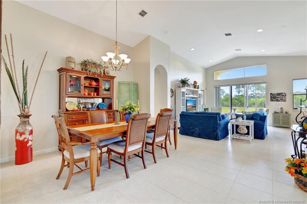 5195 Southeast Graham Drive Stuart, FL 34997 - Photo 9 of 52 a dining room with furniture and window