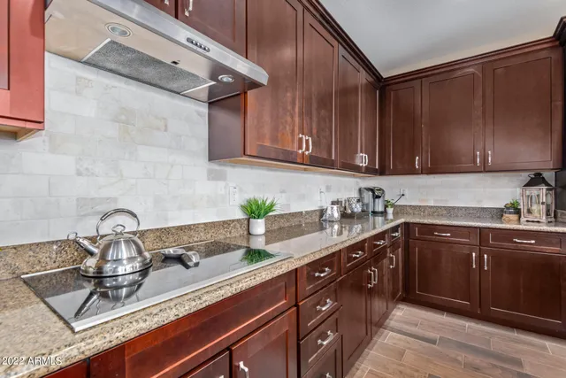 a bathroom with a double vanity sink and mirror
