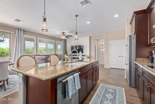 a bedroom with a bed and a television