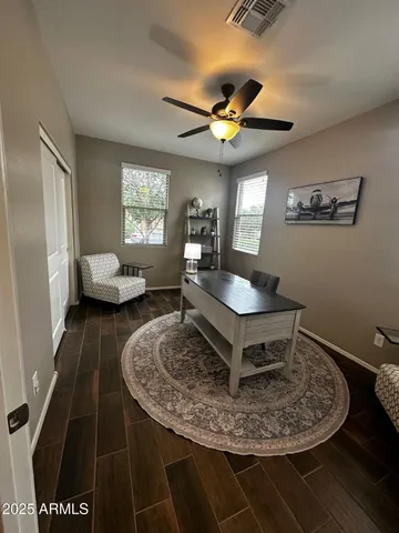 a view of balcony with furniture and garden
