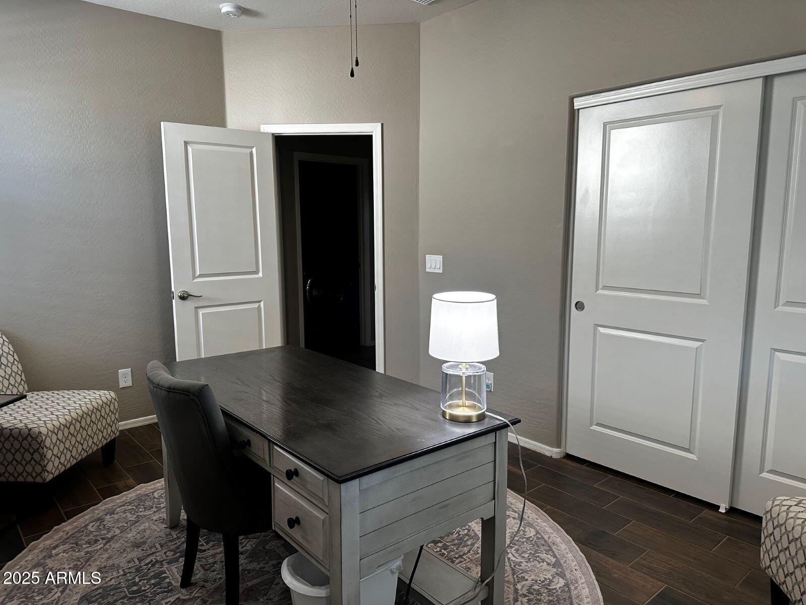 22503 East Calle De Flores Queen Creek, AZ 85142 - Photo 29 of 57 a view of a kitchen area with furniture and wooden floor