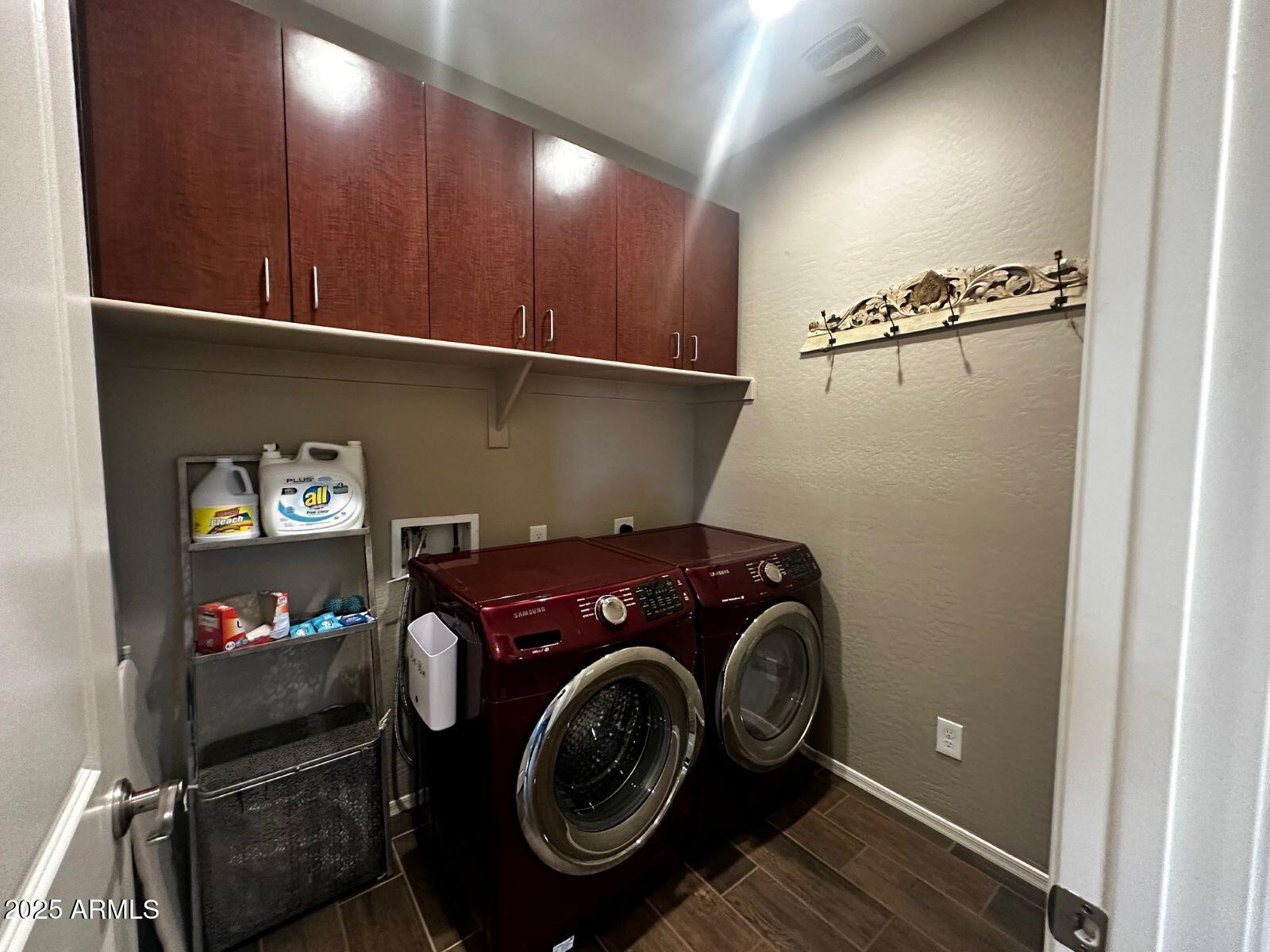 22503 East Calle De Flores Queen Creek, AZ 85142 - Photo 34 of 57 a utility room with dryer and washer