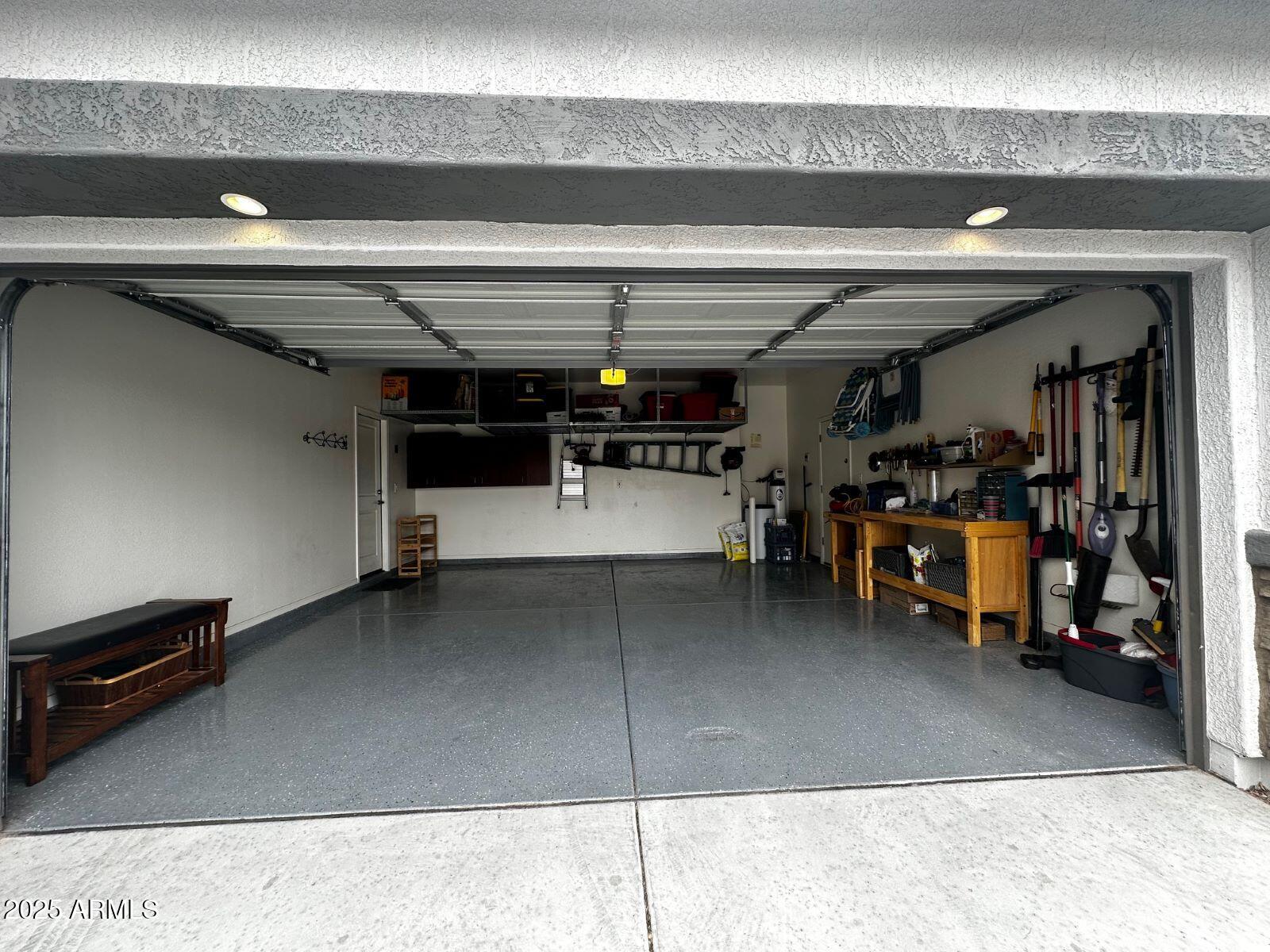 22503 East Calle De Flores Queen Creek, AZ 85142 - Photo 35 of 57 a view of a garage with storage