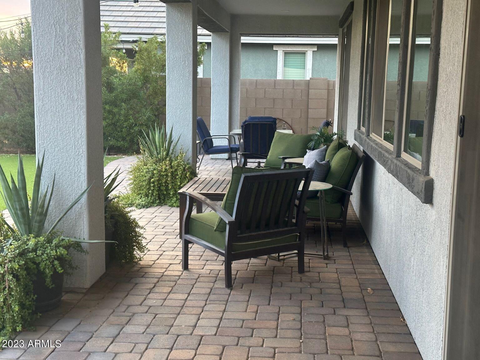 22503 East Calle De Flores Queen Creek, AZ 85142 - Photo 41 of 57 a view of balcony with furniture and garden