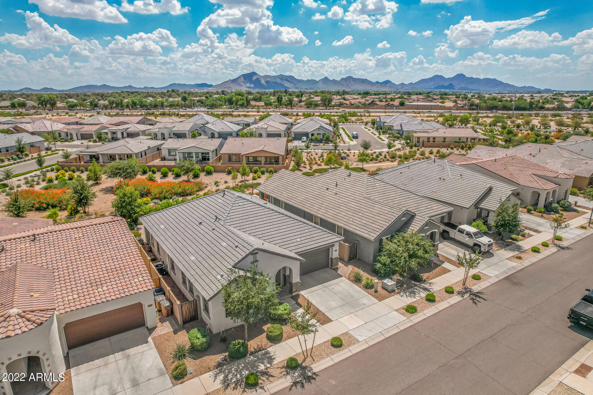 22503 East Calle De Flores Queen Creek, AZ 85142 - Photo 43 of 57 an aerial view of residential building with outdoor space