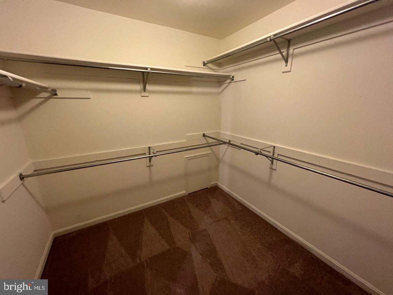 17911 Dumfries Circle Olney, MD 20832 - Photo 20 of 29 a view of a room with racks on the wall