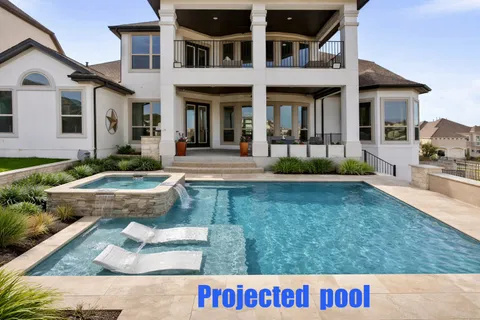 a view of a house with swimming pool and a yard