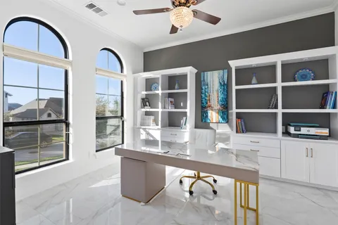 a dining room with furniture a livingroom and chandelier