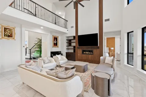 a living room with furniture and a rug