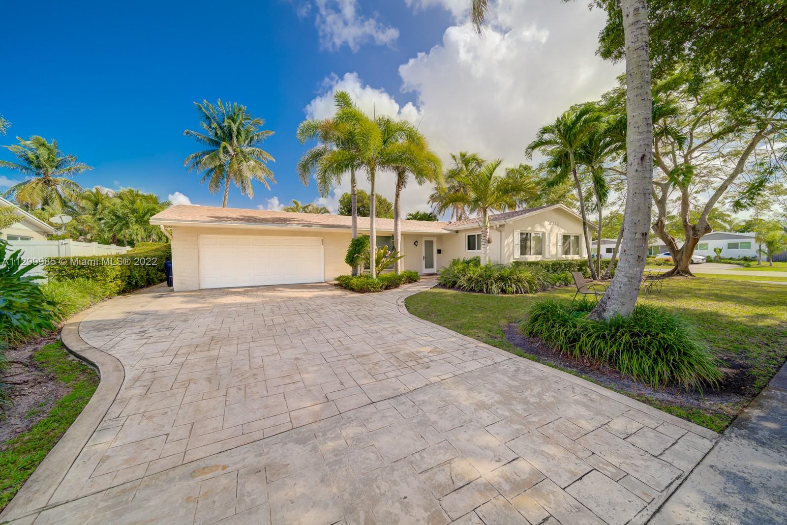 10345 Southwest 97th Street, Unit 10345 Miami, FL 33176 - Photo 3 of 4 a view of a yard with plants