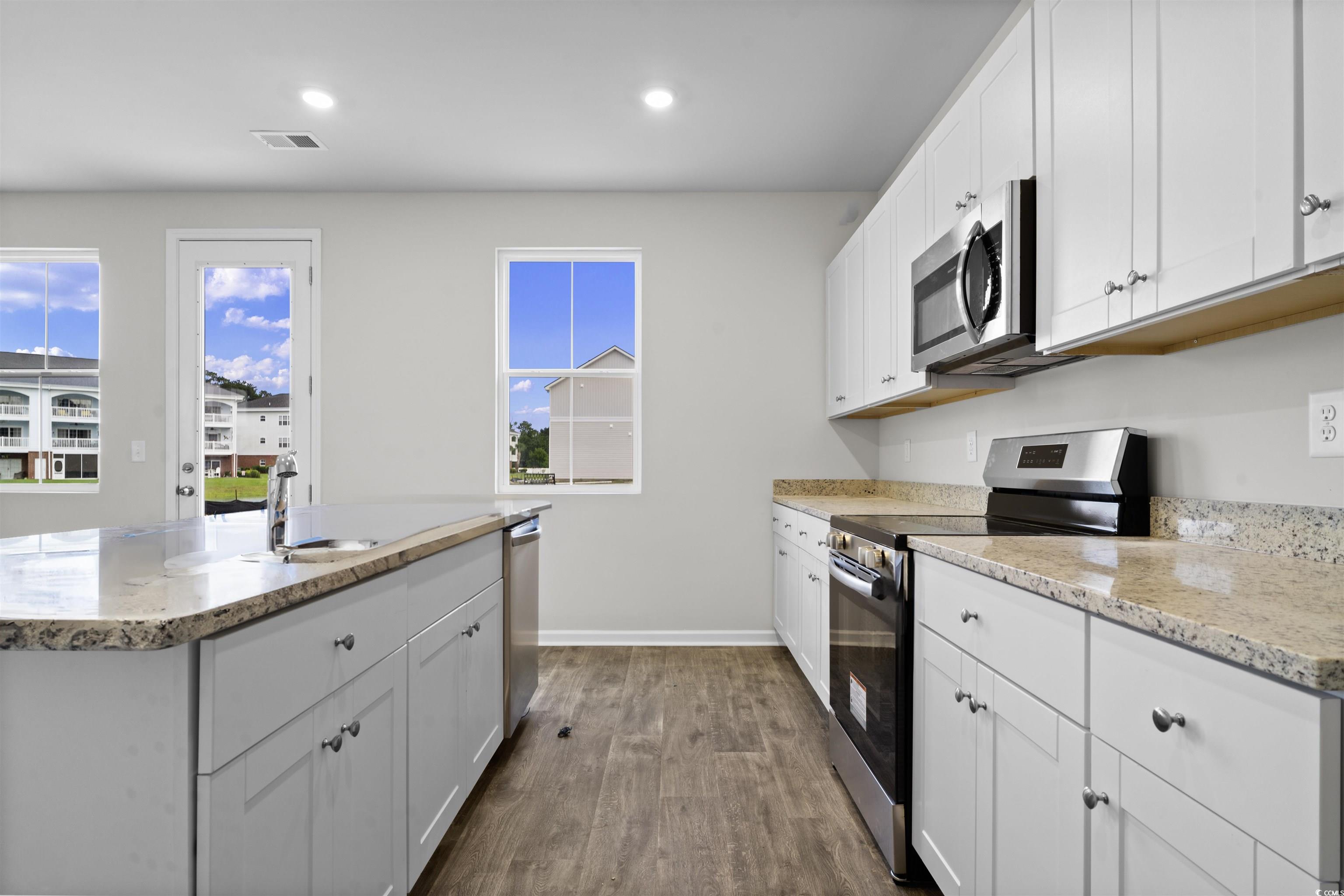 455 Falling Leaf Loop Myrtle Beach, SC 29588 - Photo 8 of 15 Kitchen with stainless steel appliances, a kitchen