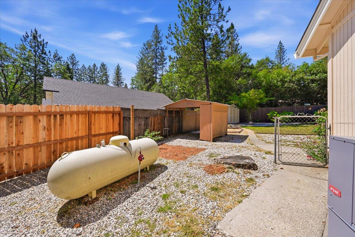 12600 Friar Tuck Road Grass Valley, CA 95949 - Photo 40 of 56 a view of a house with backyard and sitting area