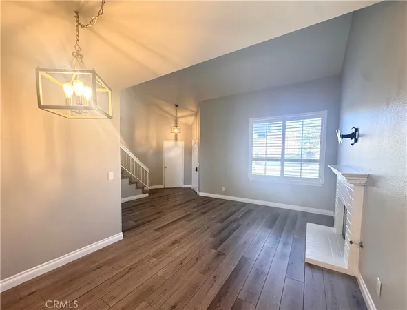 a view of kitchen and wooden floor