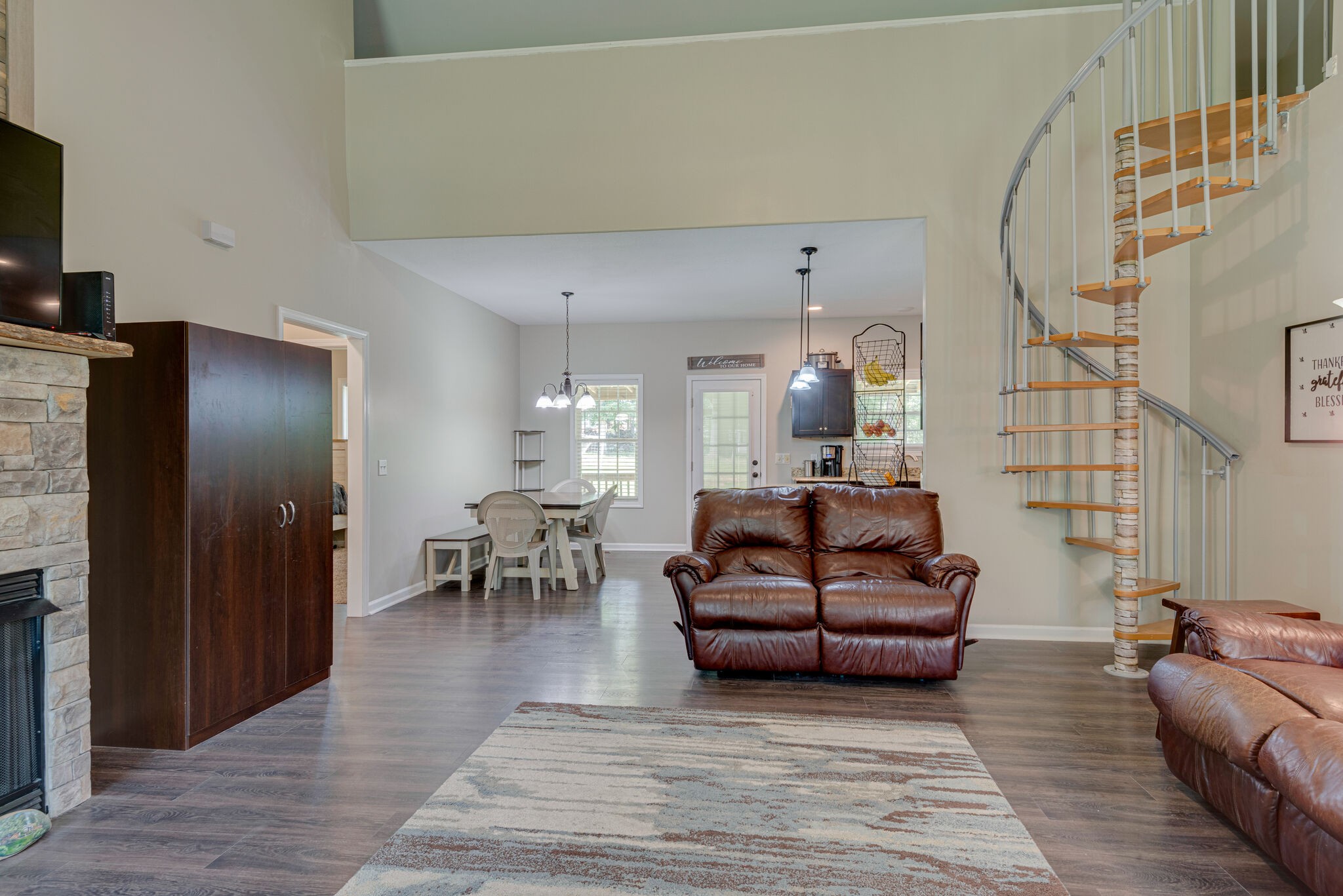 1085 Garton Road Burns, TN 37029 - Photo 8 of 27 a living room with furniture and a fireplace