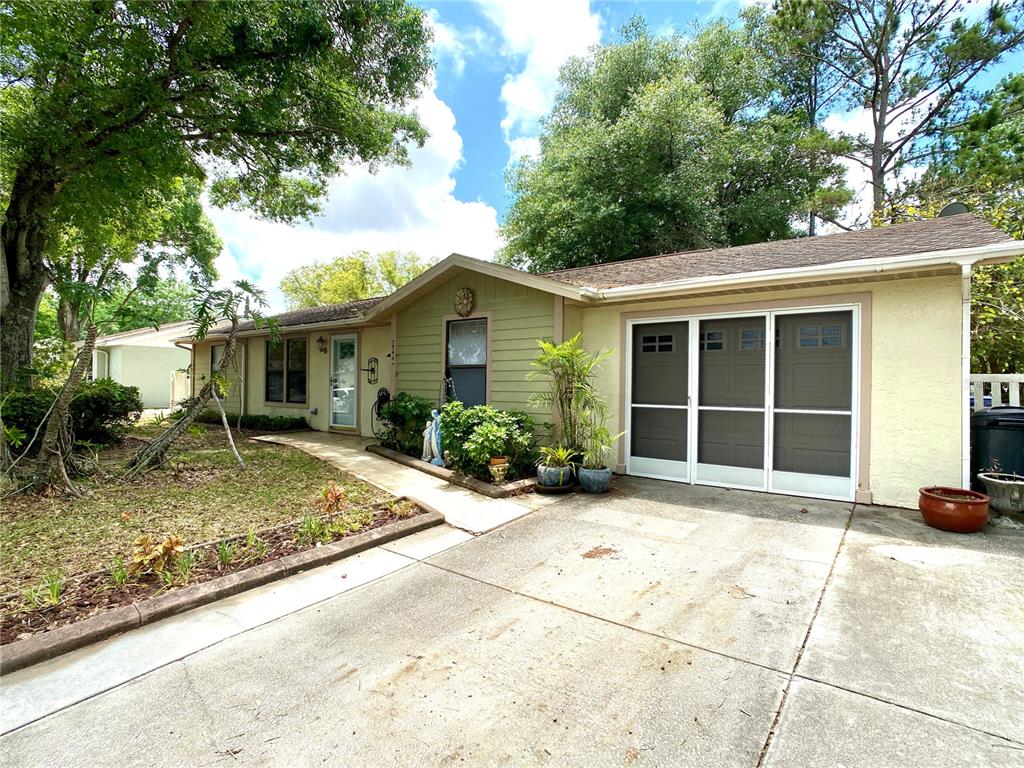 a house with trees in the background