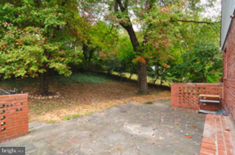 3349 Jones Bridge Road Chevy Chase, MD 20815 - Photo 14 of 17 REAR/ SIDE PATIO