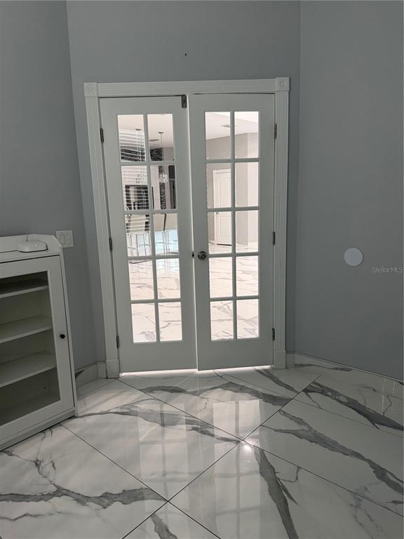 5315 3rd Bradenton, FL 34203 - Photo 14 of 41 a view of an empty room with a fireplace and a window