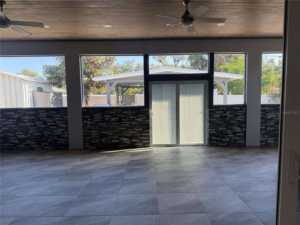 5315 3rd Bradenton, FL 34203 - Photo 29 of 41 a view of an empty room with a fireplace and a window