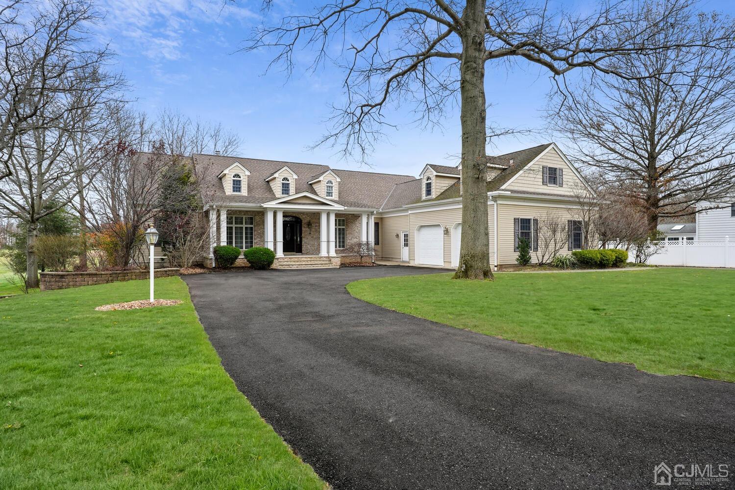 73 Davidson's Mill Road North Brunswick, NJ 08902 - Photo 1 of 51 a front view of residential houses with yard and green space