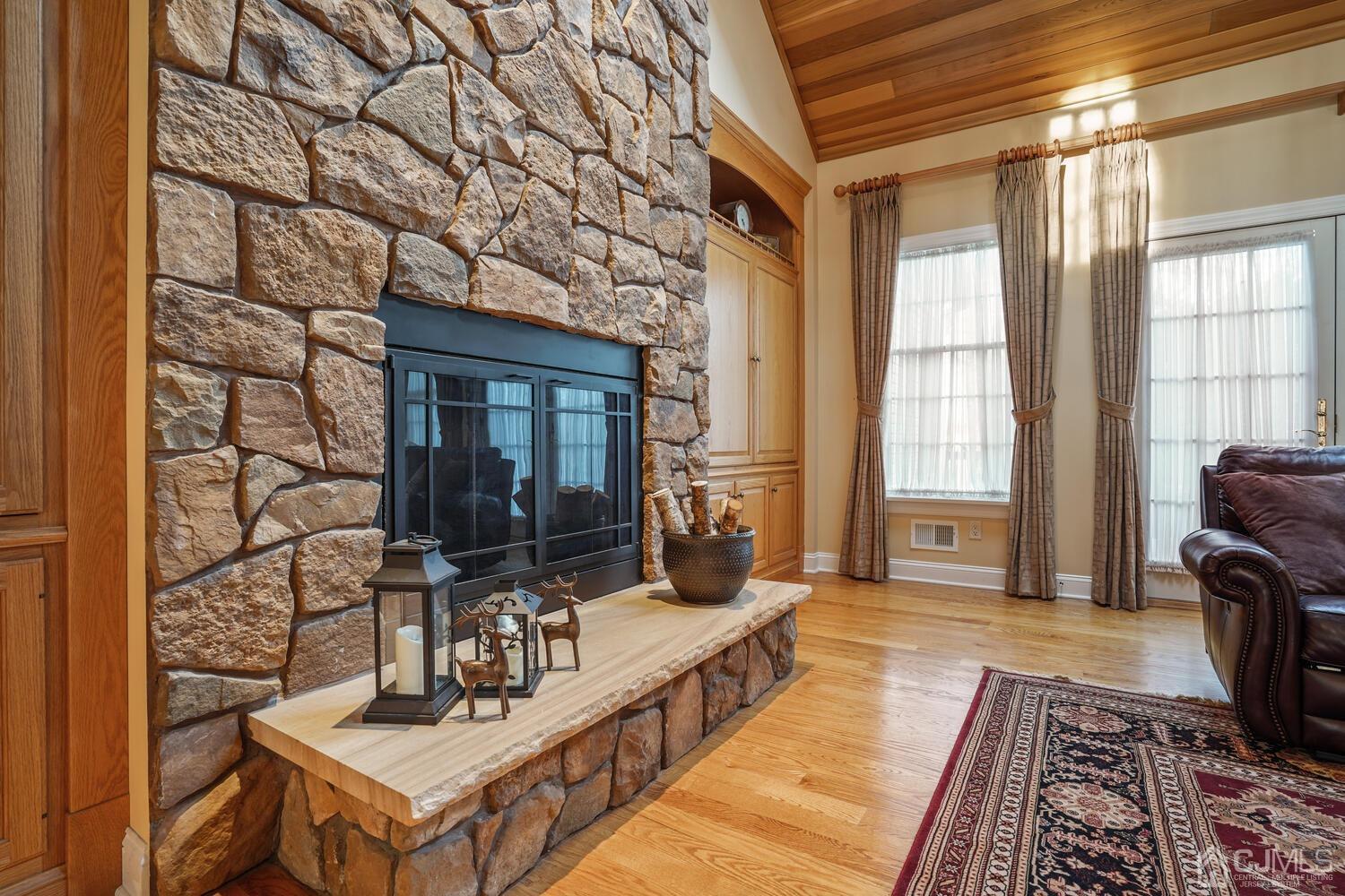 73 Davidson's Mill Road North Brunswick, NJ 08902 - Photo 13 of 51 a living room with furniture and a fireplace