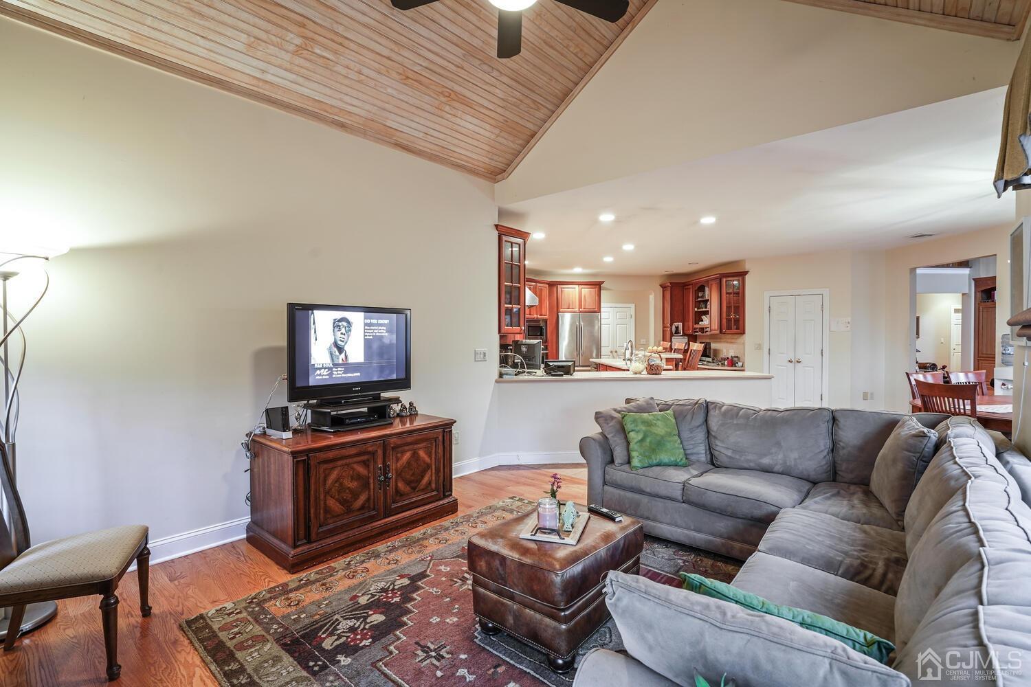 73 Davidson's Mill Road North Brunswick, NJ 08902 - Photo 25 of 51 a living room with furniture and a flat screen tv