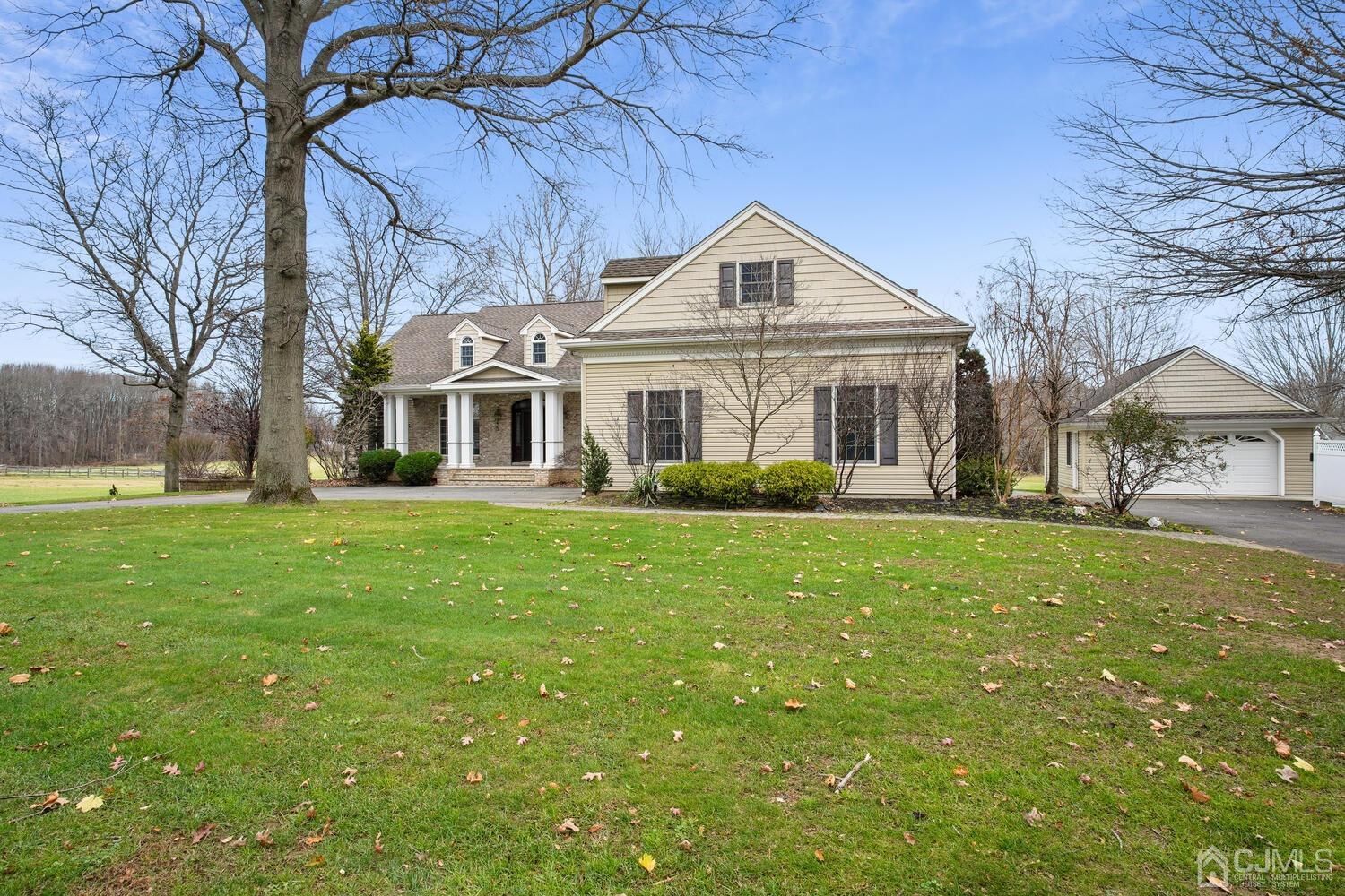 73 Davidson's Mill Road North Brunswick, NJ 08902 - Photo 4 of 51 a front view of house with yard and green space