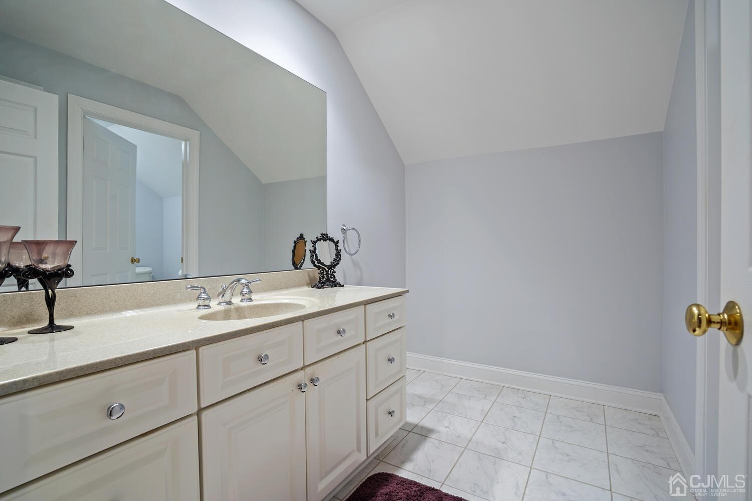 73 Davidson's Mill Road North Brunswick, NJ 08902 - Photo 39 of 51 a bathroom with a sink and vanity