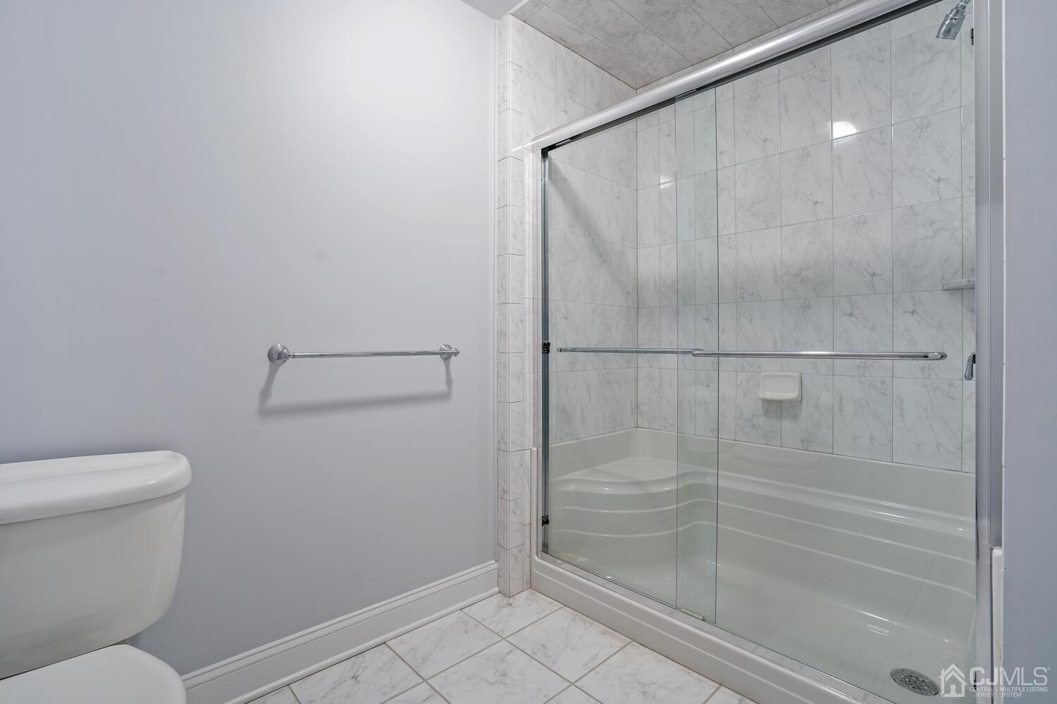 73 Davidson's Mill Road North Brunswick, NJ 08902 - Photo 40 of 51 a bathroom with a shower and toilet