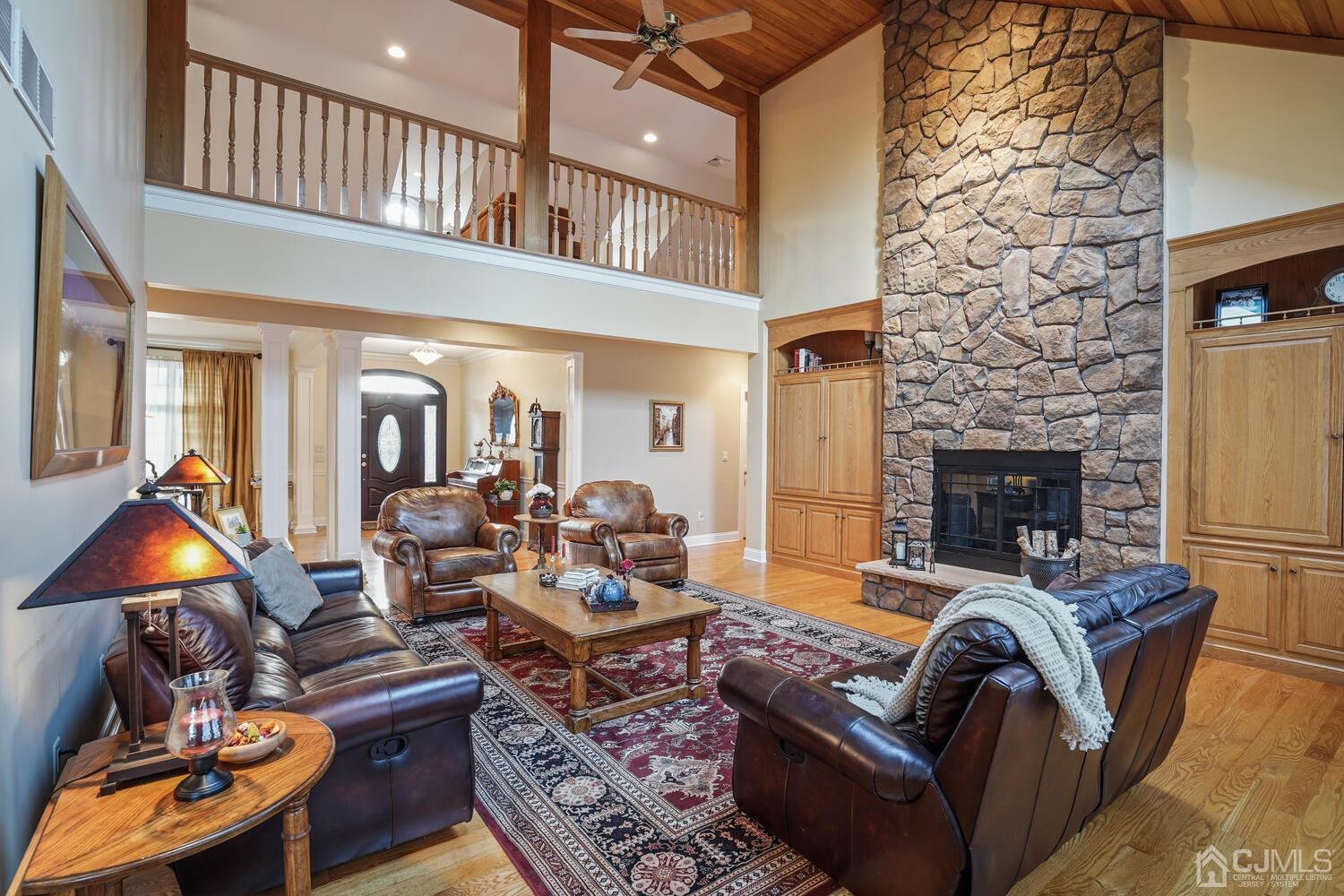 73 Davidson's Mill Road North Brunswick, NJ 08902 - Photo 10 of 51 a living room with patio fireplace furniture and a fireplace