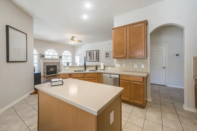 a very nice looking living room with a large window