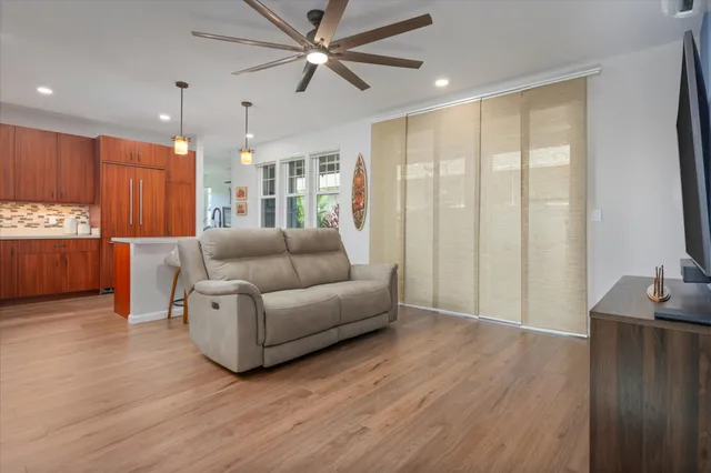 a stove top oven sitting inside of a kitchen