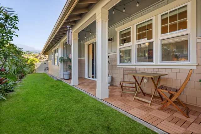 a bedroom with a bed and ceiling fan