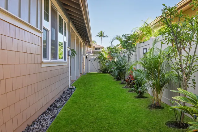 a bathroom with a double vanity sink toilet mirror and shower